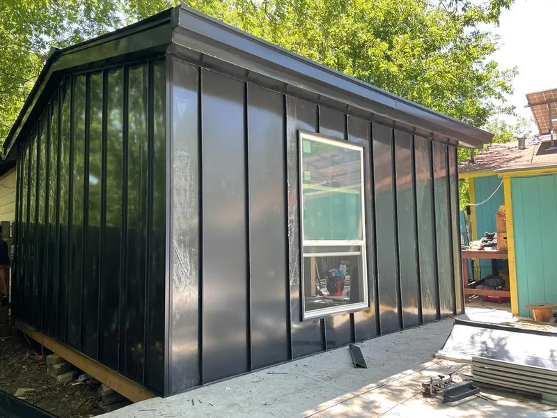 Black standing seam metal wall panels for Roof Inspection in Madison